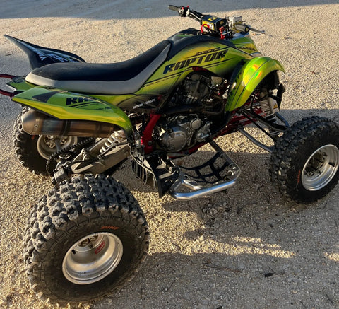 Quad bike with a green graphics kit