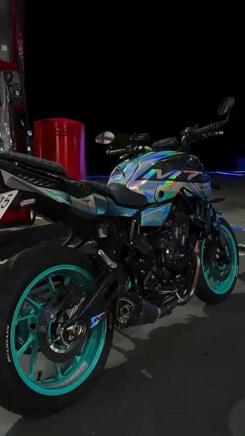 Naked bike with a turquoise graphics kit
