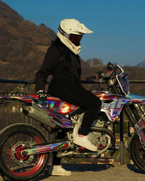 Supermoto with a holographic graphics kit in action