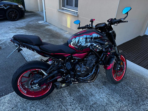 Naked bike with a black and red graphics kit