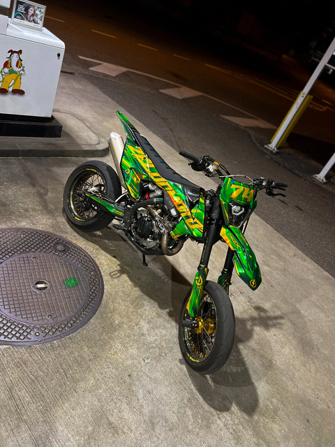 Supermotard con kit de adhesivos verde